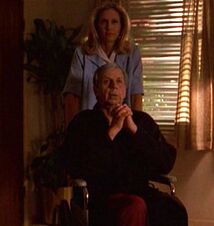 Cigarette Smoking Man in wheelchair