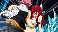 Natsu knocks Erza unconscious