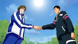Tachibana shakes hands with Tezuka