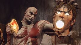 Kratos con Cabeza de Helios