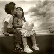 Baby-Boy-Kissing-on-Girl-Face (1)